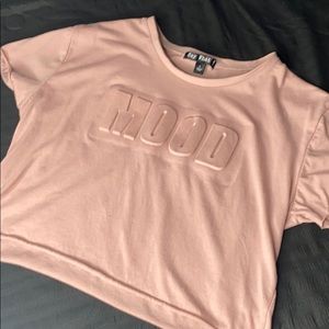 A baby pink crop top